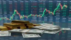 الذهب يعوض جزءًا من خسائره مع تراجع طفيف بفعل قوة الدولار الأمريكي